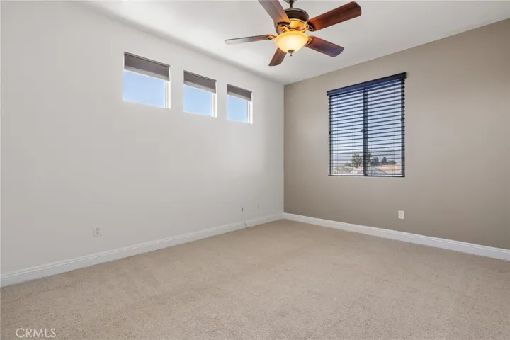 Upstairs bedroom has mountain views.