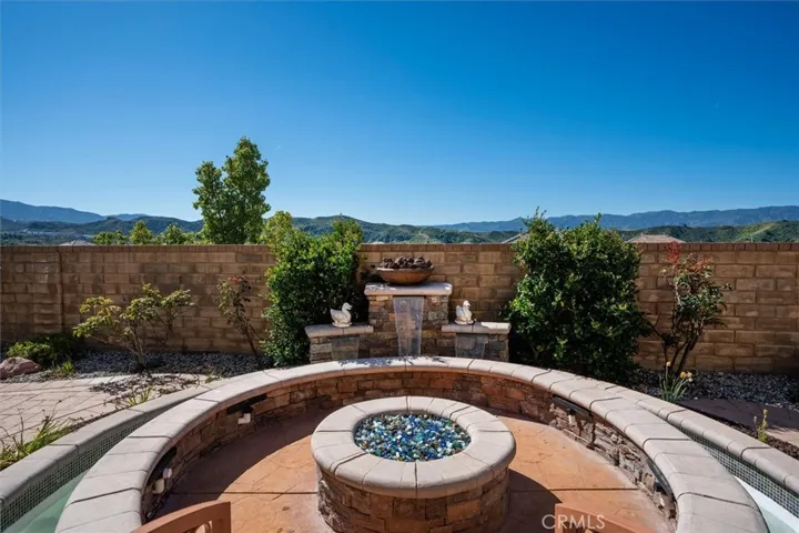 Fountain/ firepit in backyard