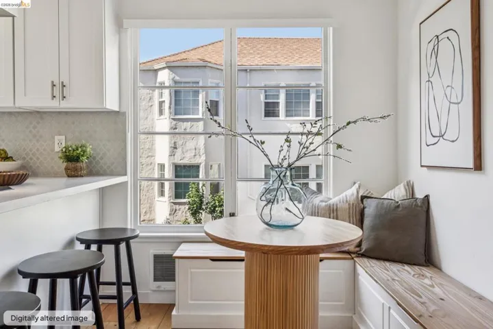 Dining room featuring breakfast area, light wood finished floors, and heating unit