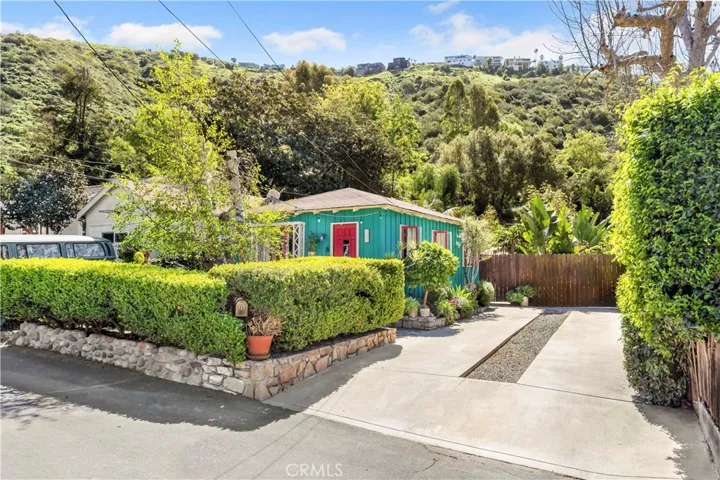 Welcome to 327 Canyon Acres. A quintessential Laguna cottage.