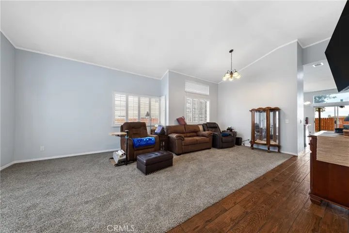 Open Living Area With Vaulted Ceilings And Comfortable Layout For Seating