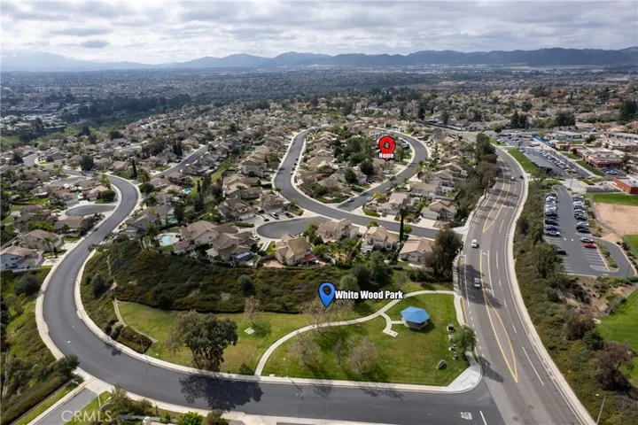 Aerial View Of Neighborhood Showing Nearby Park And Surrounding Community