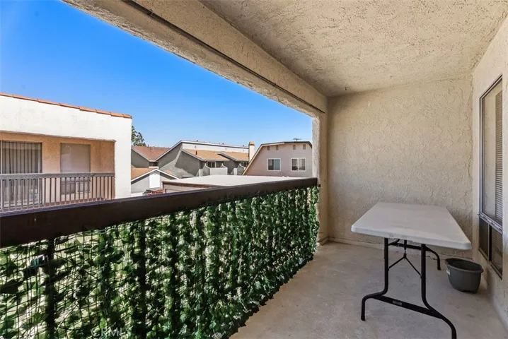 Unit C- Upper Carriage unit over the garages. 1 bedroom, 1 bath, No laundry, 2 balconies, spacious liviing space.