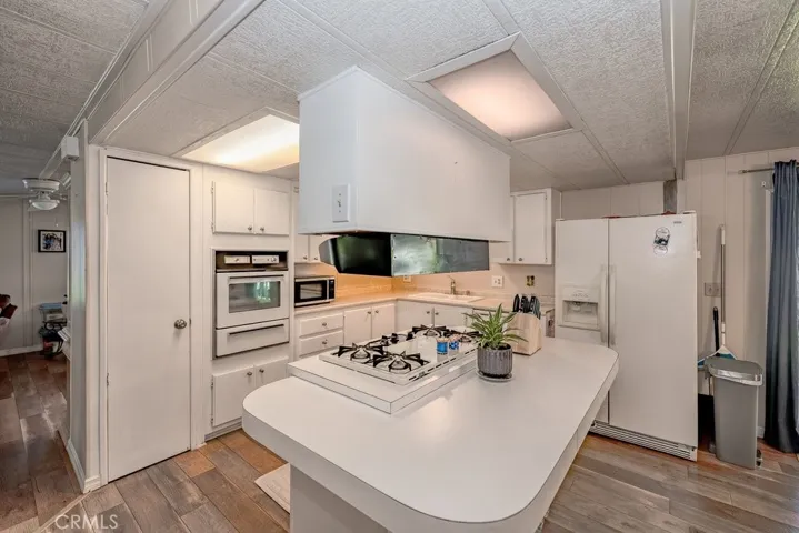 A roomy kitchen and island.