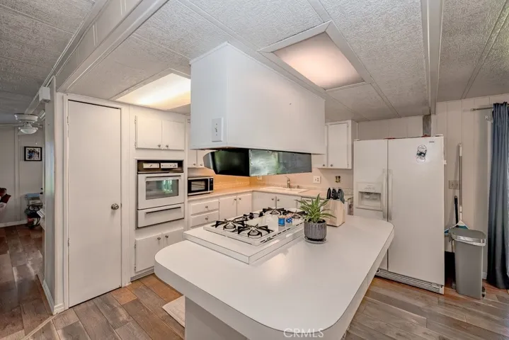 A roomy kitchen and island.