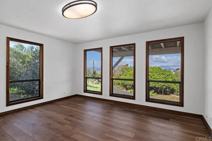 Bedroom #2 on the second floor. Bedroom could be dual master. Views of mountains and city lights.