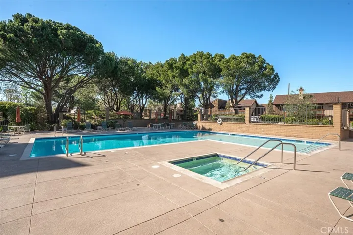 Pool and spa with an ample deck for having guests over to swim! The pool is heated seasonally!