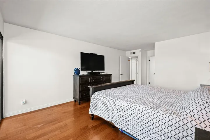 Spacious primary bedroom with attached recently remodeled bathroom!