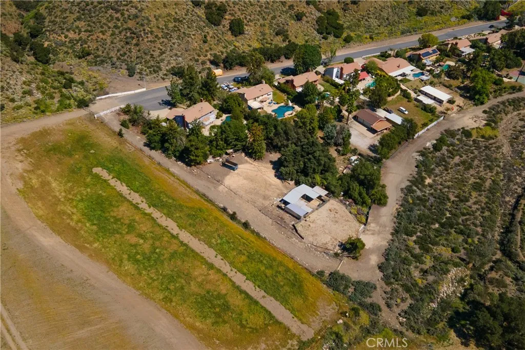 PRIVATE ACCESS ROAD TO BACK OF PROPERTY.