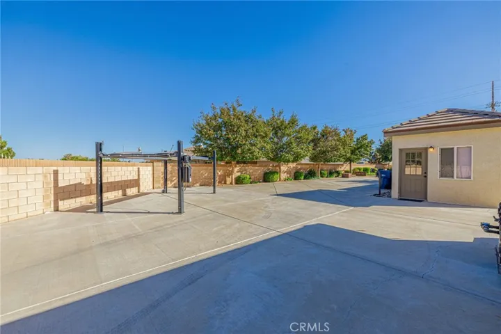Large driveway area behind the electric gates