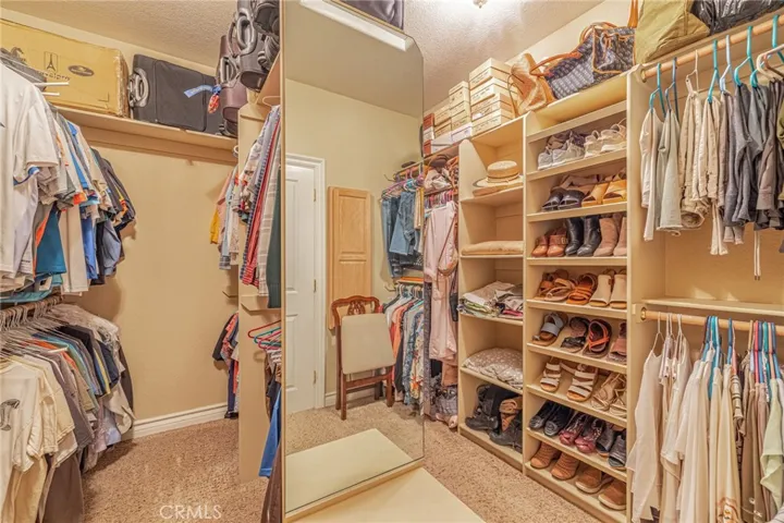 Walk-in Closet with well designed organizers