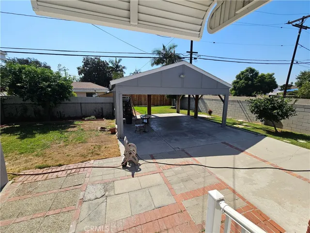 Front House Backyard With Large Covered Patio
