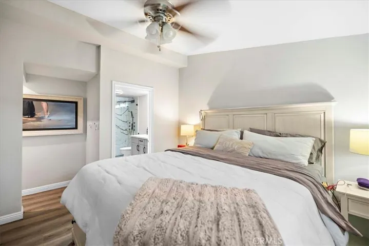 The primary bedroom is located in the front of the house, separated from the other 3 bedrooms. Has a remodeled 3/4 bathroom attached to the suite.