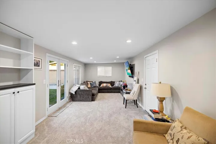 Family room has French doors that open to the large, spacious yard. There is direct access to the 2 car garage.