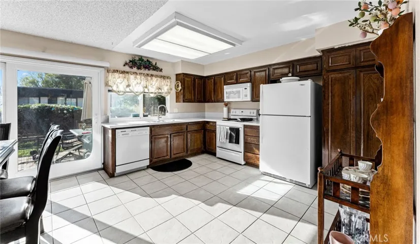 Spacious kitchen with plenty of cabinet space and casual dining area