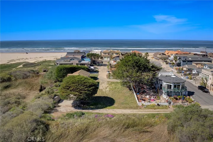 6,000 square foot lot walking distance to the sand.