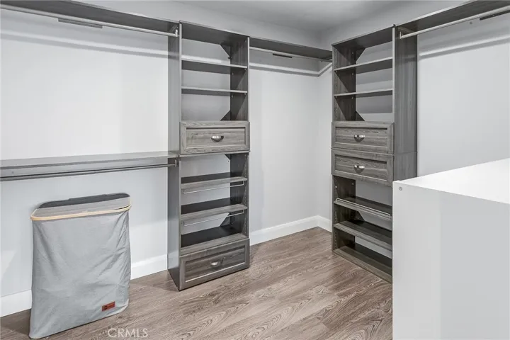 Two spacious walk-in closets provide generous wardrobe and storage space.