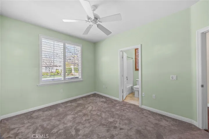 Front bedroom with mirrored wardrobe closet
