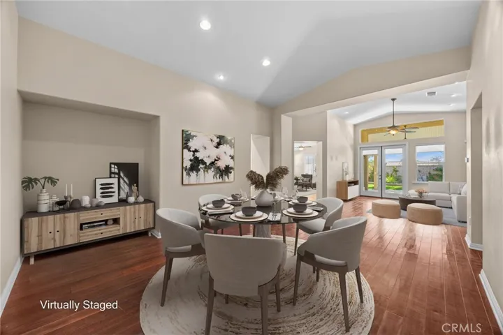 Living room and eating area virtually staged.