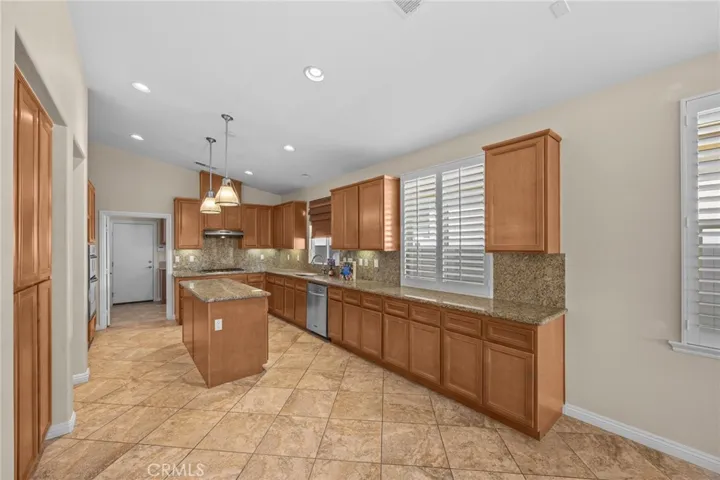 Kitchen with center island.  (Looks much larger in person)