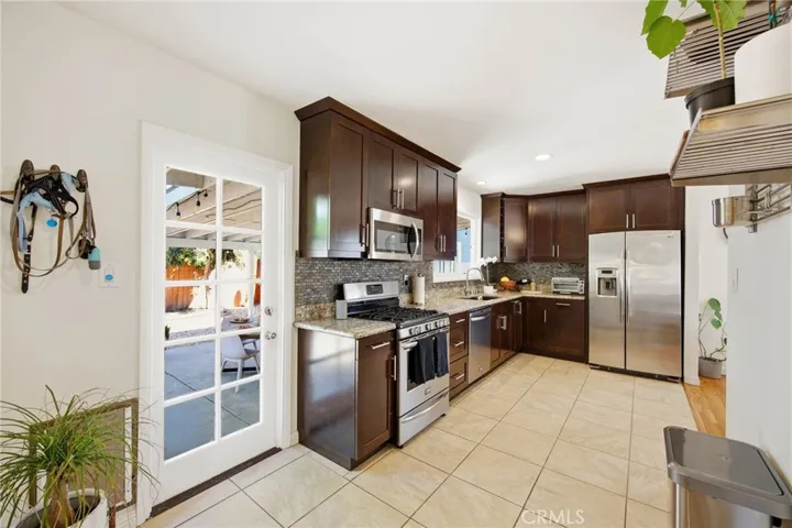Direct access from the kitchen to the backyard.