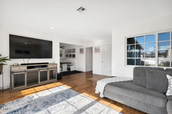 Living room abuts the dining area