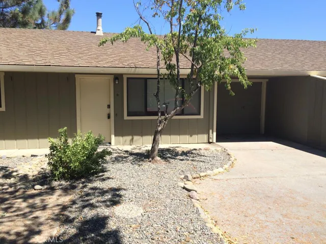 Rear unit driveway and garage.