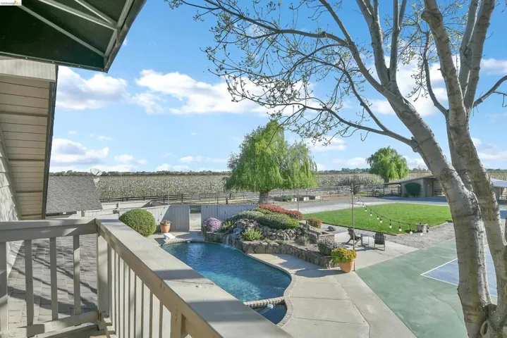 Balcony with view of pool