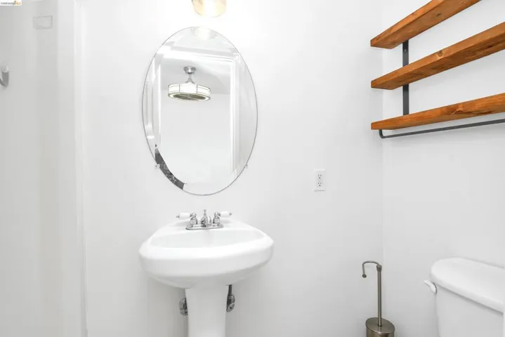 Half bath featuring toilet