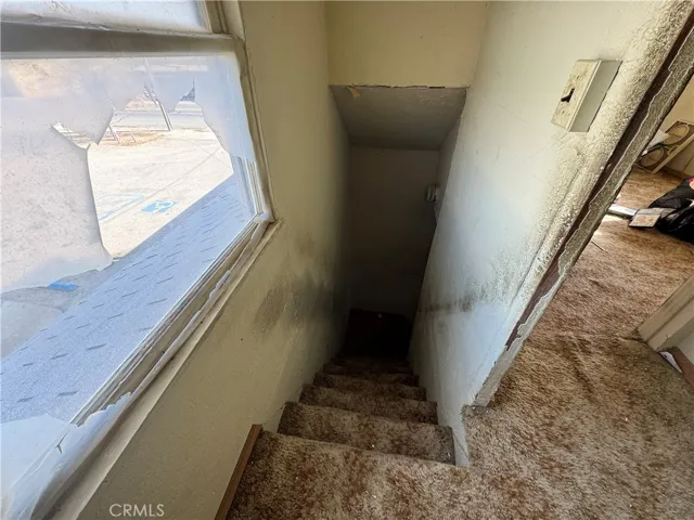 Down the stairs