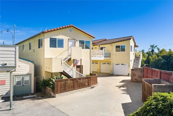 Back of building, entrance to 3 bedroom