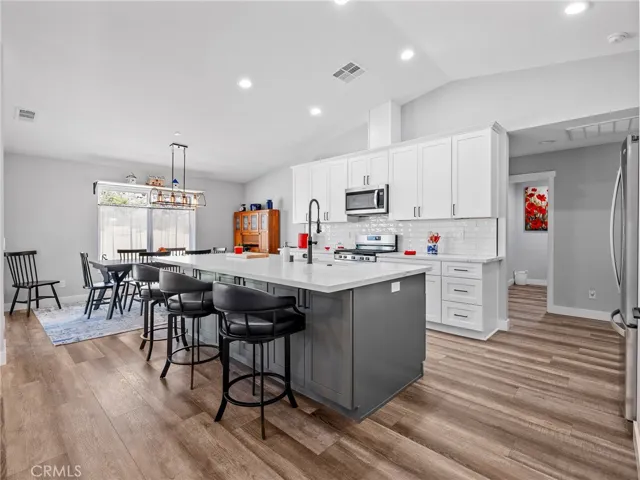 Large island in kitchen open to great room