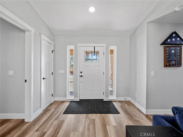 Beautiful front entry with powder room off to the east for convenience