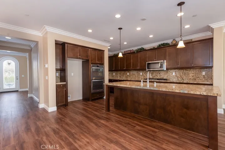 Kitchen and Tuscany front door
