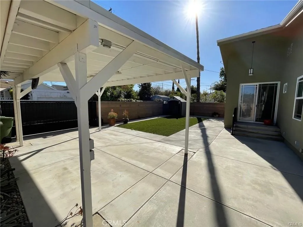 TWO CAR CARPORT WITH MOTORIZED GATE
