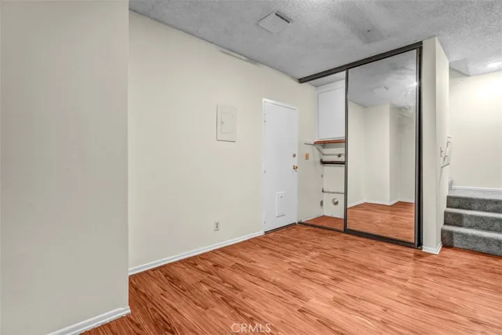 bonus room with laundry area in closet