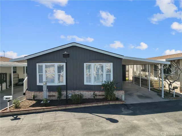 Front elevation with landscaped entry