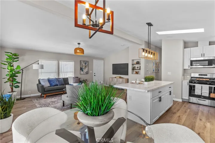 Bright dining area beside kitchen island