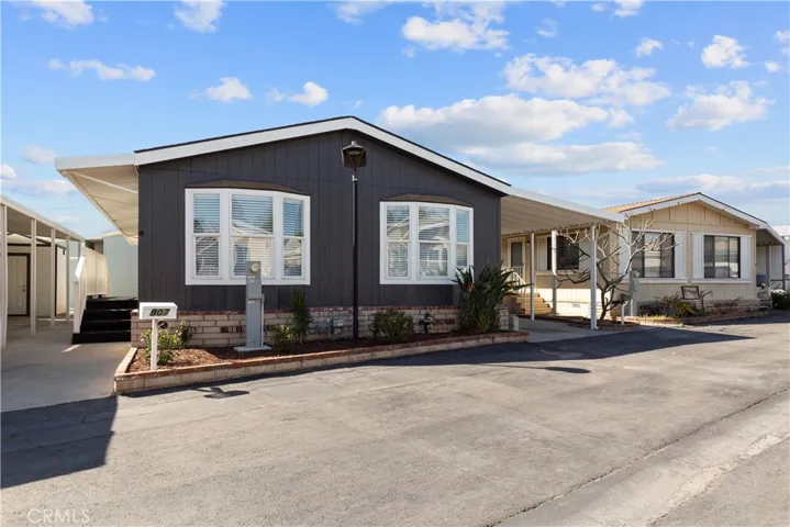Front exterior with bay windows