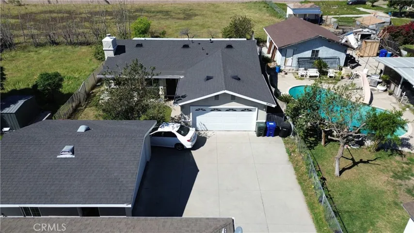 Rear house with attached 2 car garage.