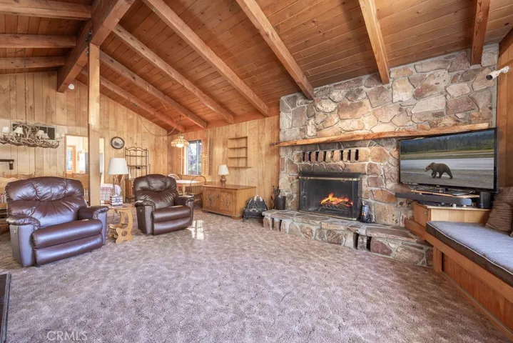 Fireplace and TV images have been digitally altered.
