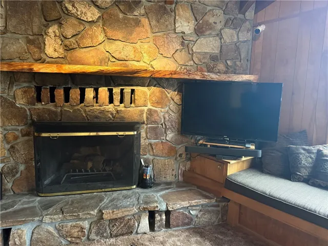 Unaltered photo of Fireplace and TV