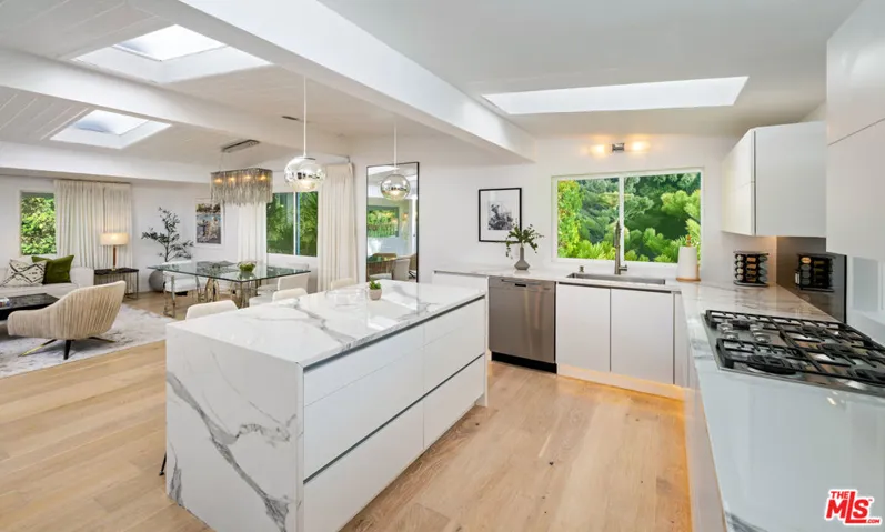 bright open kitchen to living