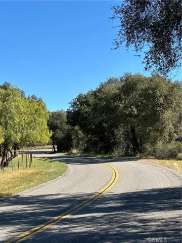 Red Mountain Road in front of of parcels.