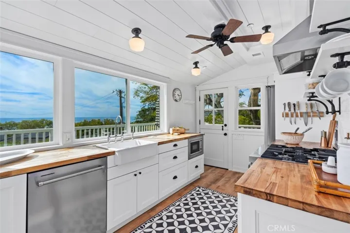 Butcher block kitchen counters complete the vintage look!
