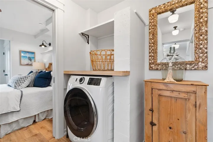 Laundry area located downstairs near the guest bedrooms.