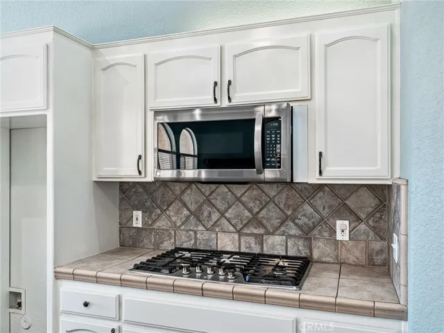 Kitchen stovetop and Microwave