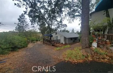 View from driveway of house with garage on right