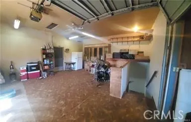 Bonus room/hobby area above garage