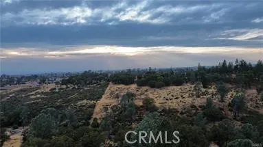View of sun setting from upper portion of property